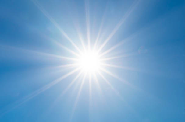 beautiful nature of blue sky with clouds and sun shines bright in the day