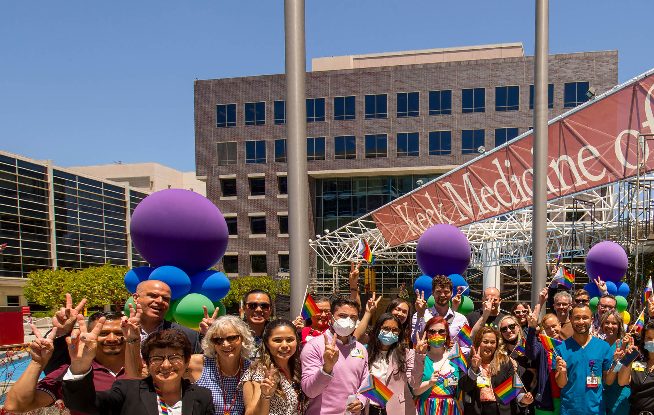 USC Keck Medicine of USC staff turns out during the raising ceremony of the Progress Pride Flag on the first day of Pride Month, June 1, 2022  (Photo Gus Ruelas)  