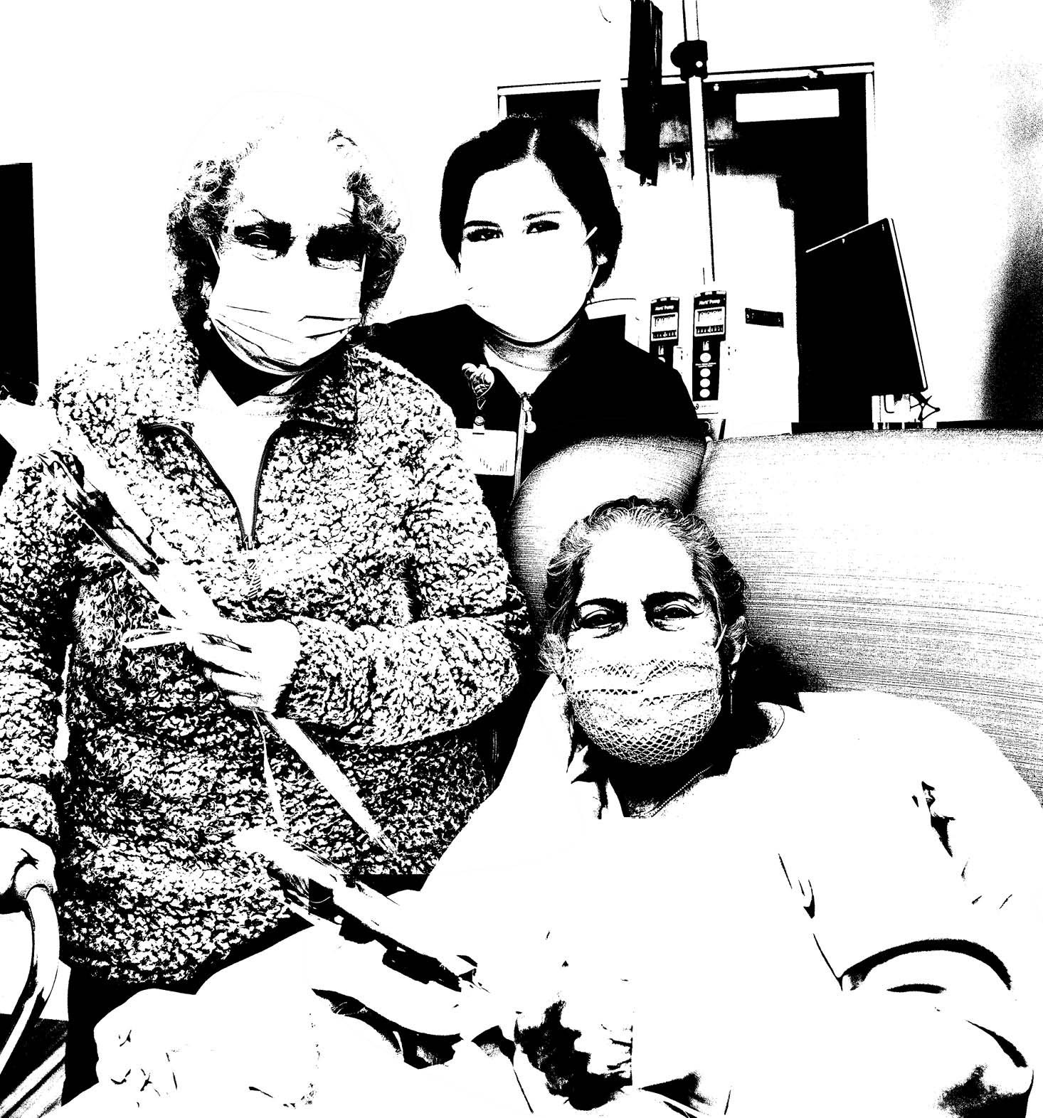 Sonnia Gutierrez (patient) and Teresa de Santos (patients mother) receive a rose from nurse Viridiana Rosas - Mother's Day Roses 2022 - HC3 Keck Medicine of USC