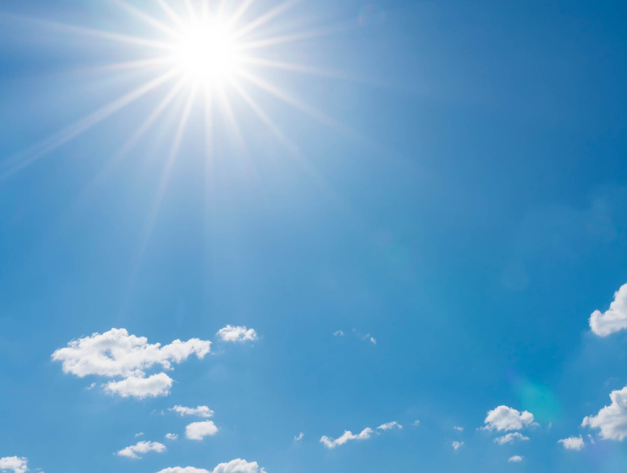 beautiful nature of blue sky with clouds and sun shines bright in the day